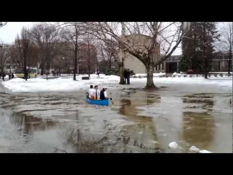 6 0 - Engineering students go on a canoe ride. This area is usually dry and is a frequently used pathway. During the snow melt and heavy rain it tends to get flood...