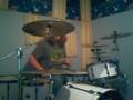 happythecow messing around on drums