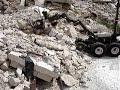 Andros Robot attempting to remove rebar from rubble pile
