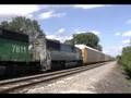BNSF 7811 leads a WB stacker w/ EMD Oakway, Crest Hill, IL.
