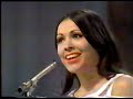 Massiel sings the winning song for Spain, 'La La La', at the 1968 Eurovision Song Contest from the Royal Albert Hall in London on 06/04/68. This is her reprise performance of the song at the end of the show, when she sings the final chorus in English (something not allowed during the actual contest in those days). This is followed by the orchestra playing out to the closing credits.This was the first ESC to be available in colour, although virtually all European stations were still only transmitting in black & white at the time. So very few people would have actually seen the live transmission in colour. Even in the host country, the UK, the live transmission was only in B & W, as BBD1 had yet to go colour. However, a colour recording was shown the next day on BBD2 (the only colour channel), for the benefit of the handful of viewers who had bought one of the very expensive new colour TVs.