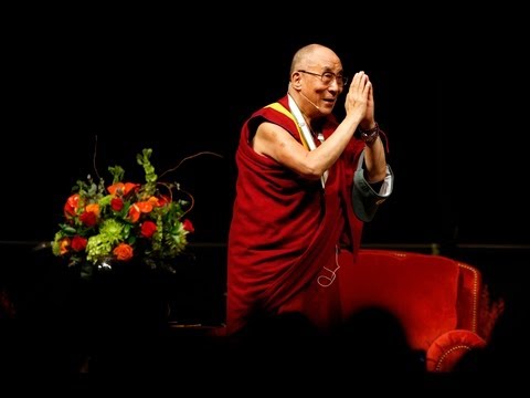 dalai - His Holiness the 14th Dalai Lama of Tibet takes the stage at the UO to ovation and cheers. (Chris PIetsch and Tiernan Pietsch/The Register-Guard)