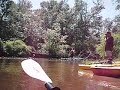 Boy Poling His Kayak
