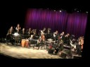 afro latin jazz orchestra performing at symphony space in new york city.