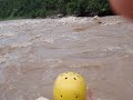 Water rafting going through a class 3...