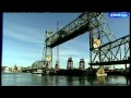 Barge Moves Under Memorial Bridge