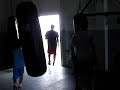 Miguel Cotto hitting the heavy bag in Bairoa Gym