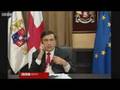 Saakashvili eats his tie