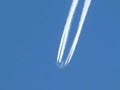 A four engine aircraft trail A four engine aircraft trail