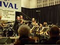 The Mingus Big Band trumpet section trades off on some solo time. Alex Sipiagin, Kenny Rampton, and Lew Soloff
