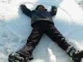 Anfernee Making his first snow angel Anfernee Making his first snow angel