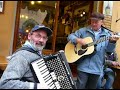 GUITAR AND ACCORDIAN OUTSIDE ARISTOS BAR IN BARGA