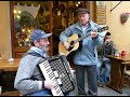 GUITAR AND ACCORDIAN OUTSIDE ARISTOS BAR IN BARGA