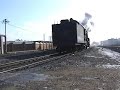 Chinese steam - QJ 1830 leads & 1675 banks a coal train