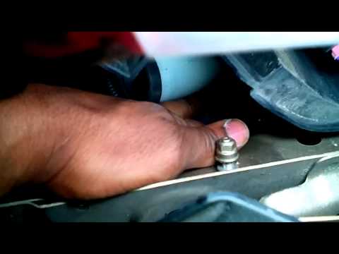 How to replace a 2008 Chevy Malibu headlight Bulb