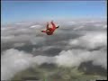 Skydiving in orange suit in taft, california