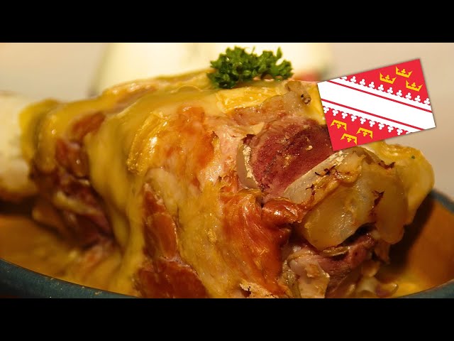 Flambierte Haxe gratiniert mit Münsterkäse