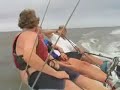 Wakeboarding behind an E-Scow Sailboat Wakeboarding behind an E-Scow Sailboat