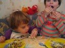 Kids eating spaghetti Kids eating spaghetti