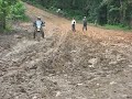 KLR 650 crossing the mud