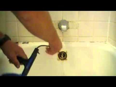 how to use an electric snake to unclog a drain