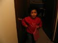 Binta pulls out her second tooth.