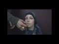 A step-by-step tutorial on how to wear a modern hijab style with a flower.