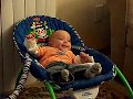 cute baby laughing at crazy sister