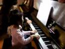 Ching-ching playing Piano with her teacher