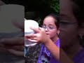 Riley catches a crawfish
