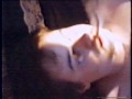 Steve's ageless dirge reveals a prone McCabe at Chippendale Hall, Dunedin 1987, coins on shut eyelids, candles melting into offering hands, unattended cigarette smoking between his lips, 1957 Isle of Man Golden Jubilee TT races flicker across his corpse-like demeanour. 