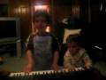 noah and arik dancing and playing piano