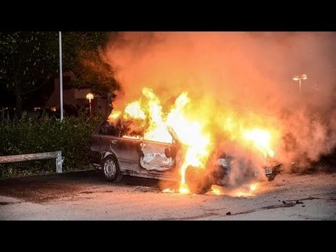 The 4th day RIOTS RAGE in an IMMIGRANT suburb of Sweden's capital