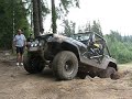 Wrangler driving up short slope Wrangler driving up short slope