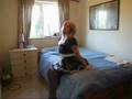 Housemaid in thighlength boots