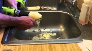 How a Man Peels a Potato