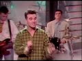 morrissey singing last of the international playboys on top of the pops in 1989 with andy rourke, mike joyce and craig gannon.