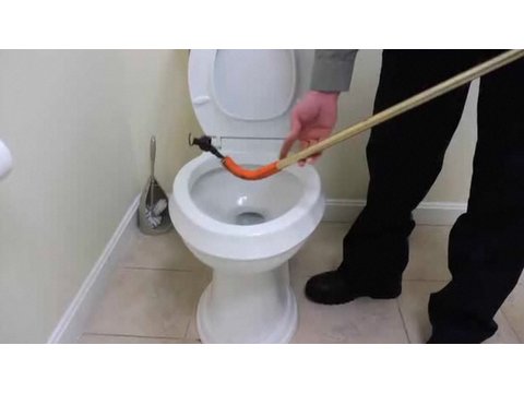 how to unclog a low flow toilet