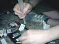 TV Videos - Rolling weed at outdoor.