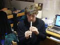 Ross playing tin whistle