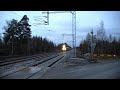 Express train 810 passes Murtomäki level crossing Express train 810 passes Murtomäki level crossing