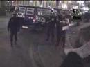 women gets beaten by police