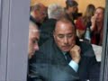 Berlusconi eating booger
