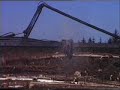 JCB excavator with stroke processing boom