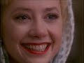 after meeting an influential agent(in real life, ben lyon), who arranges a screen test for norma jean, who then has cosmetic enhancements to alter her appearance.  she also adopts the name of marilyn monroe.  contrary to belief, her name is not taken from the american president, it's actually her mother's maiden name.