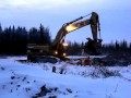 Cat 385CL and Volvo A40,Komatsu HM400 ADTs