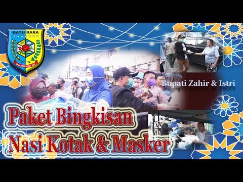 Bupati Batu Bara dan Ketua TP PKK Membagikan Masker dan Nasi Kotak