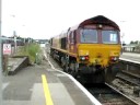 EWS 66141 - Class 66 pulls away from Didcot Parkway EWS 66141 - Class 66 pulls away from Didcot Parkway