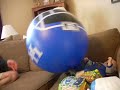 Scott kicks the beach ball
