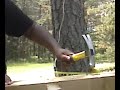 Watch me try to bang a nail into a block of wood. Watch me try to bang a nail into a block of wood.